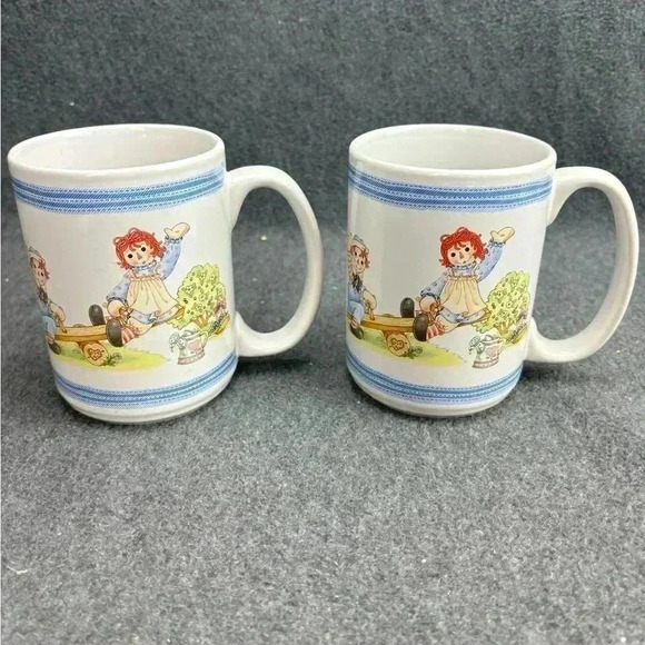 Raggedy Ann and Andy Coffee Cup Houston Harvest Wood Seesaw Wagon Set Of 2 - Picture 1 of 6